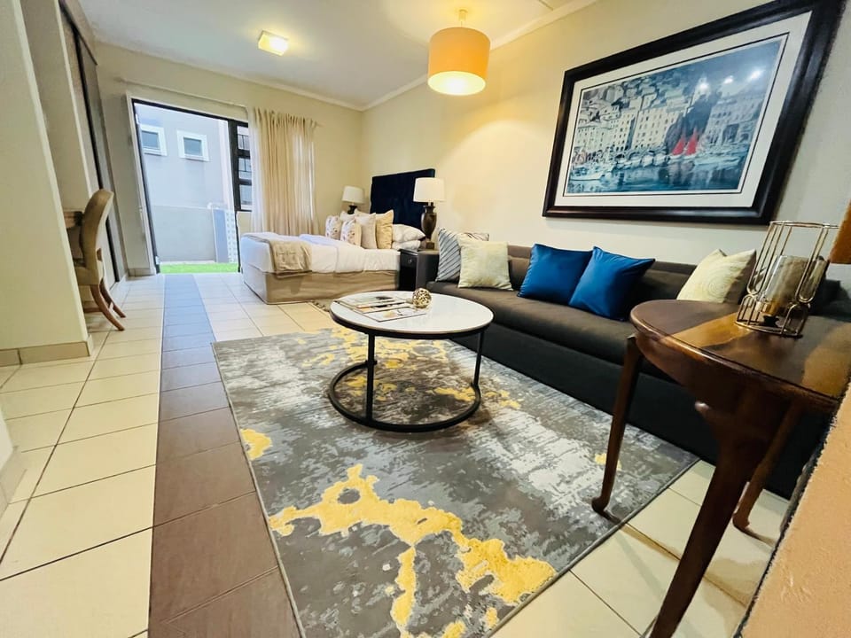 Bed, Living room, Seating area, Bedroom