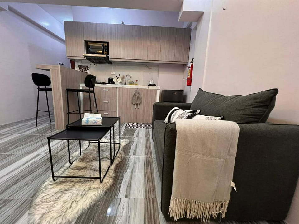 Bears Den Cozy 1BR with balcony facing city and amenity near Mactan Airport Apartment in Lapu-Lapu City