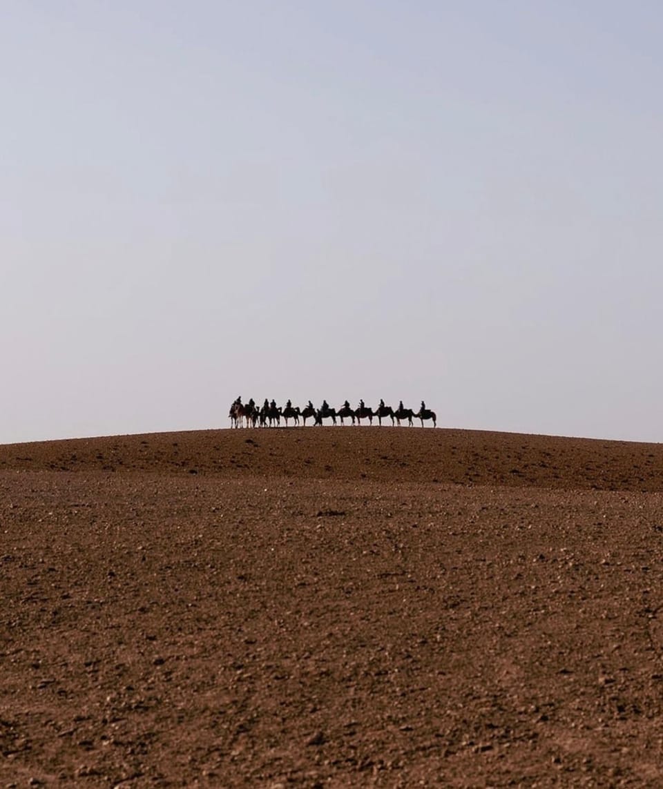 Agafay Private evening camel ride sunset dinner show private experience Campground/ 
RV Resort in Marrakesh-Safi