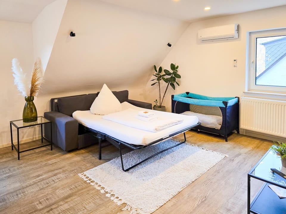 Bed, Seating area, Bedroom