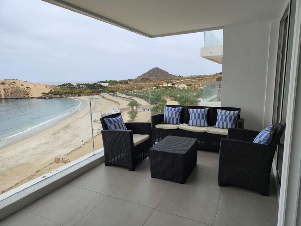 Nearby landmark, Natural landscape, View (from property/room), Balcony/Terrace, Beach, Sea view, Sunset