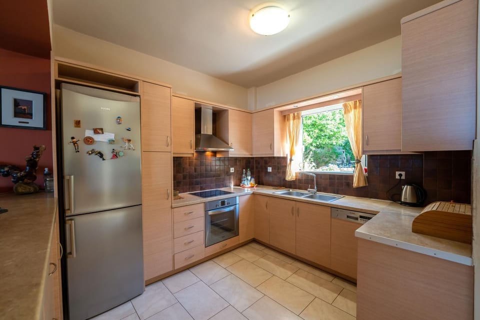 Kitchen or kitchenette, dishwasher, oven, stove