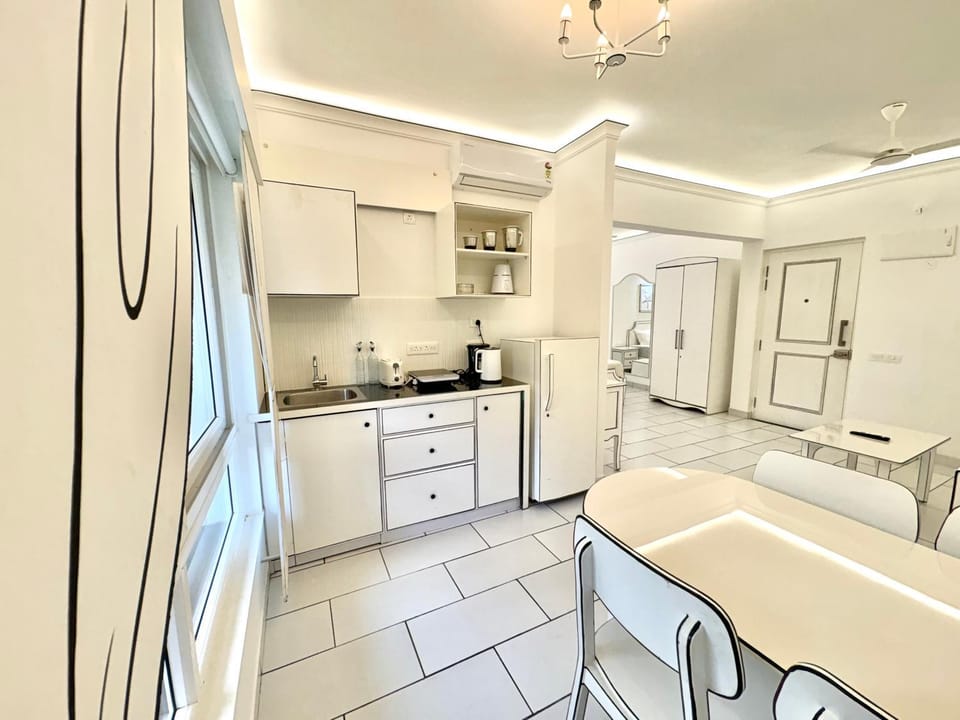 Kitchen or kitchenette, stove, toaster
