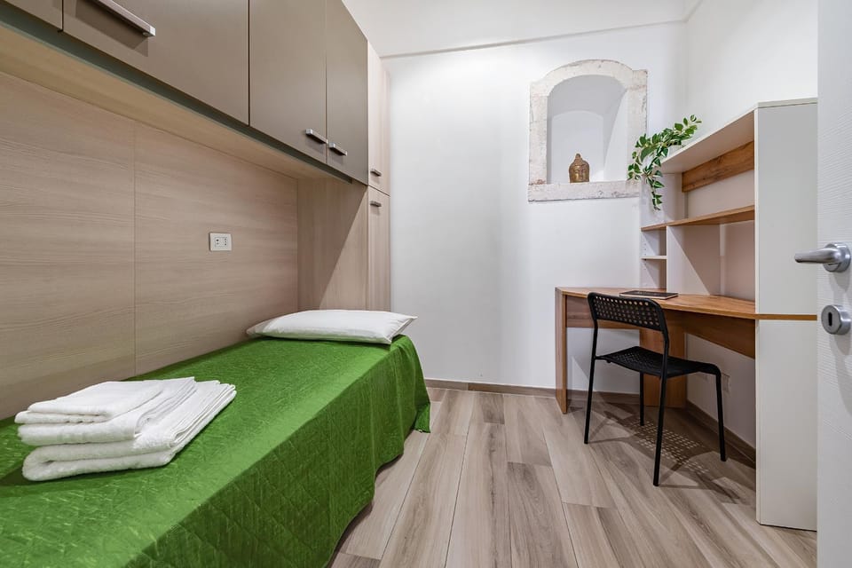 Bed, Photo of the whole room, Seating area, Bedroom, towels, wardrobe, air conditioner