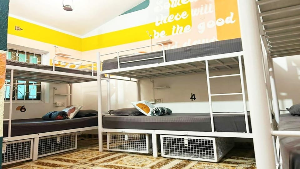 Photo of the whole room, bunk bed, air conditioner