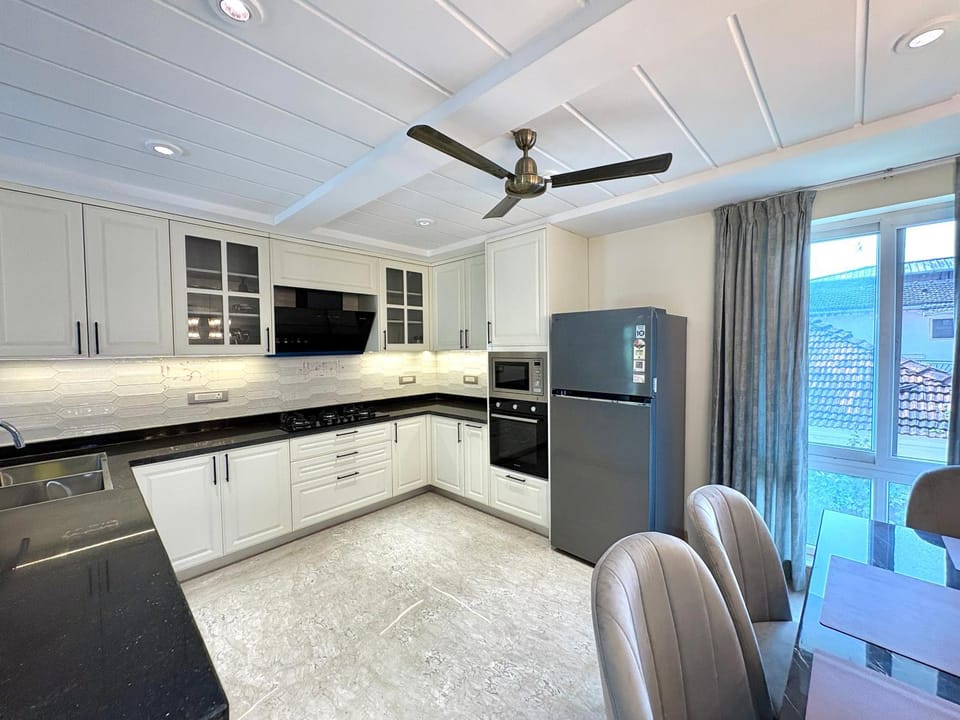Kitchen or kitchenette, oven, stove