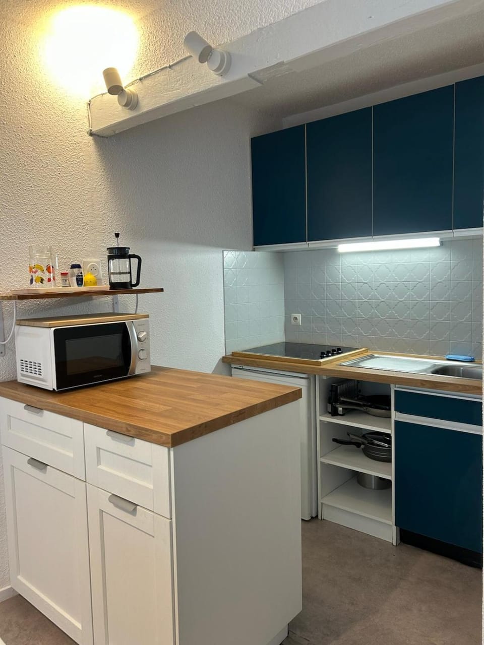 Kitchen or kitchenette, stove, toaster