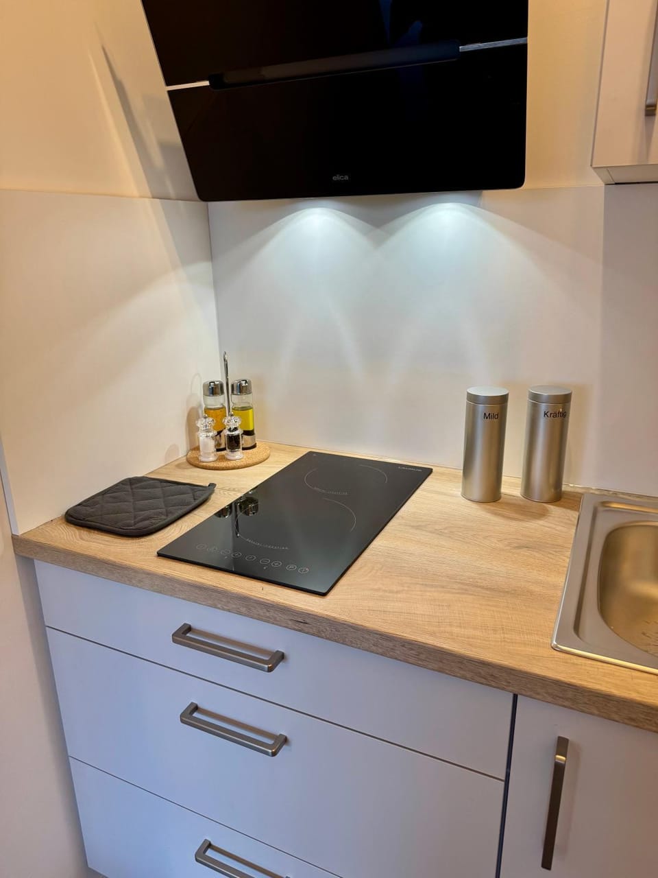 Kitchen or kitchenette, stove