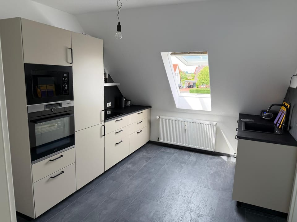 Kitchen or kitchenette, oven, stove