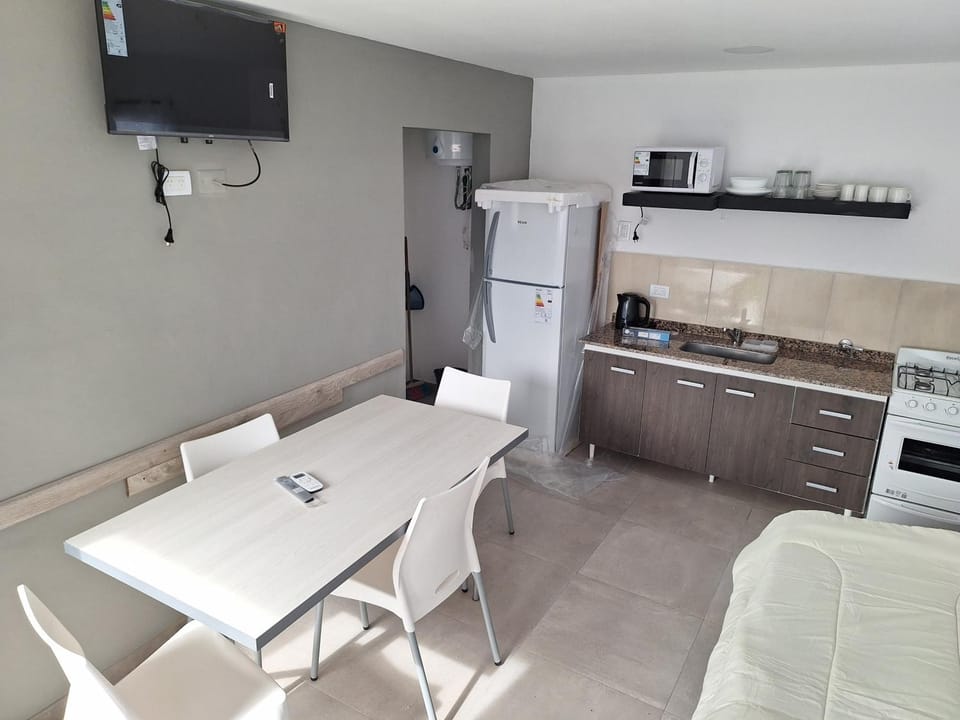 Kitchen or kitchenette, Living room, Seating area, Dining area