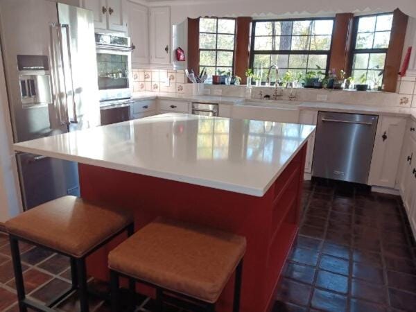 dishwasher, microwave, oven, storage, stove, towels, kitchen