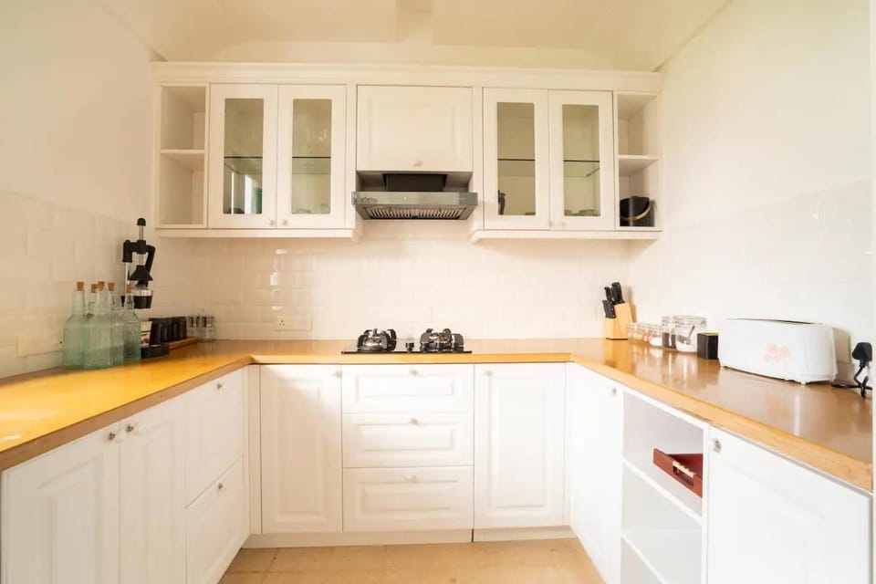 Kitchen or kitchenette, stove, toaster