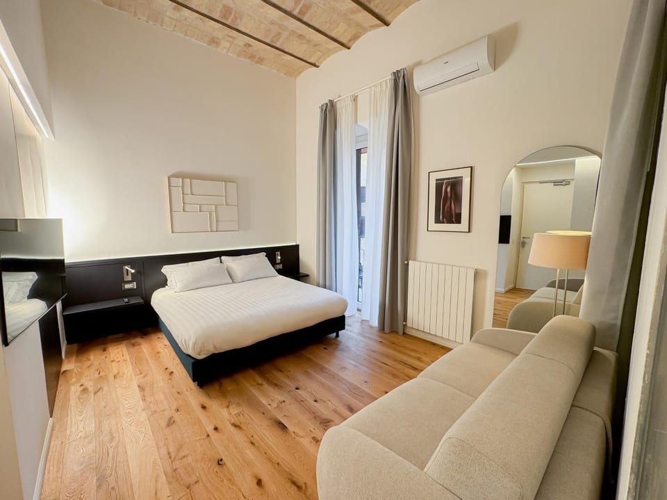 Bed, Living room, Seating area, Bedroom