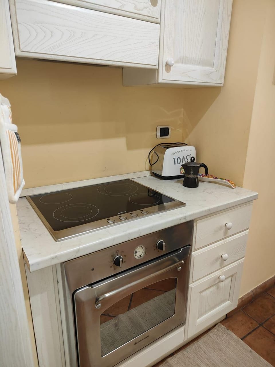 Kitchen or kitchenette, stove