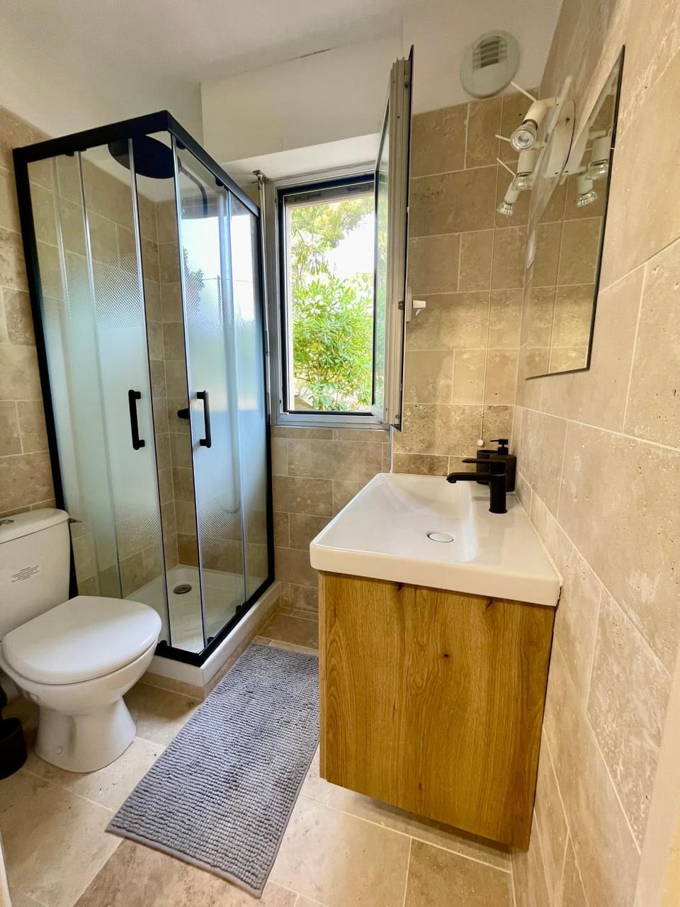 Bathroom, hair dryier, towels, air conditioner