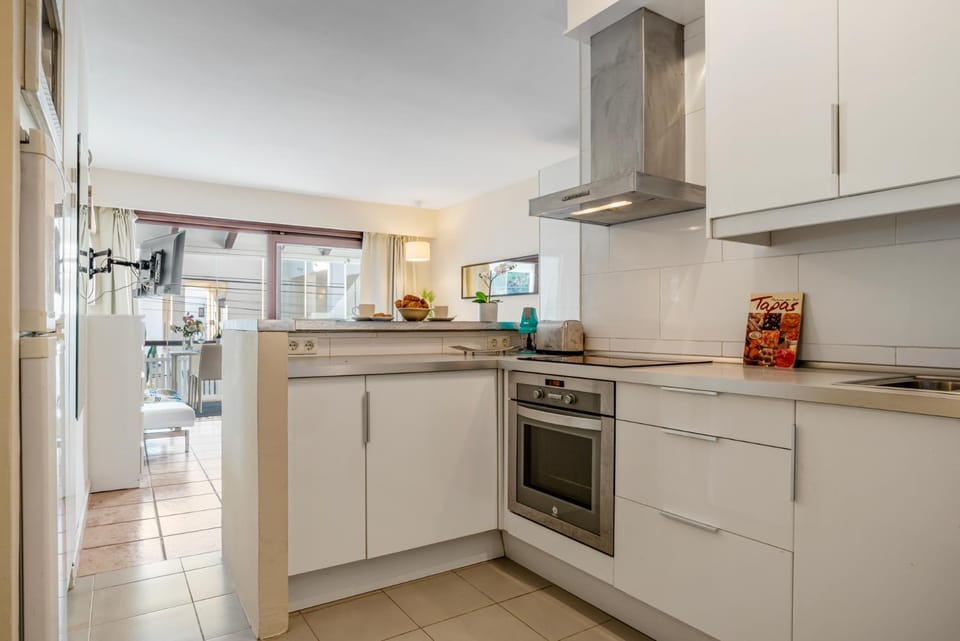 Kitchen or kitchenette, oven, stove, toaster