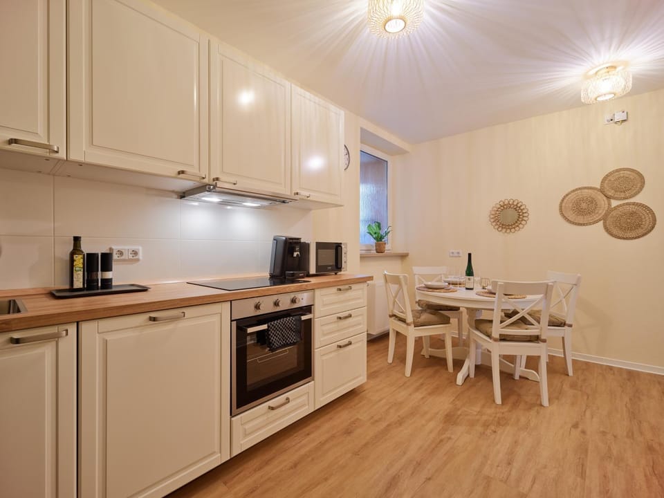Kitchen or kitchenette, Dining area, dishwasher, oven, stove, toaster