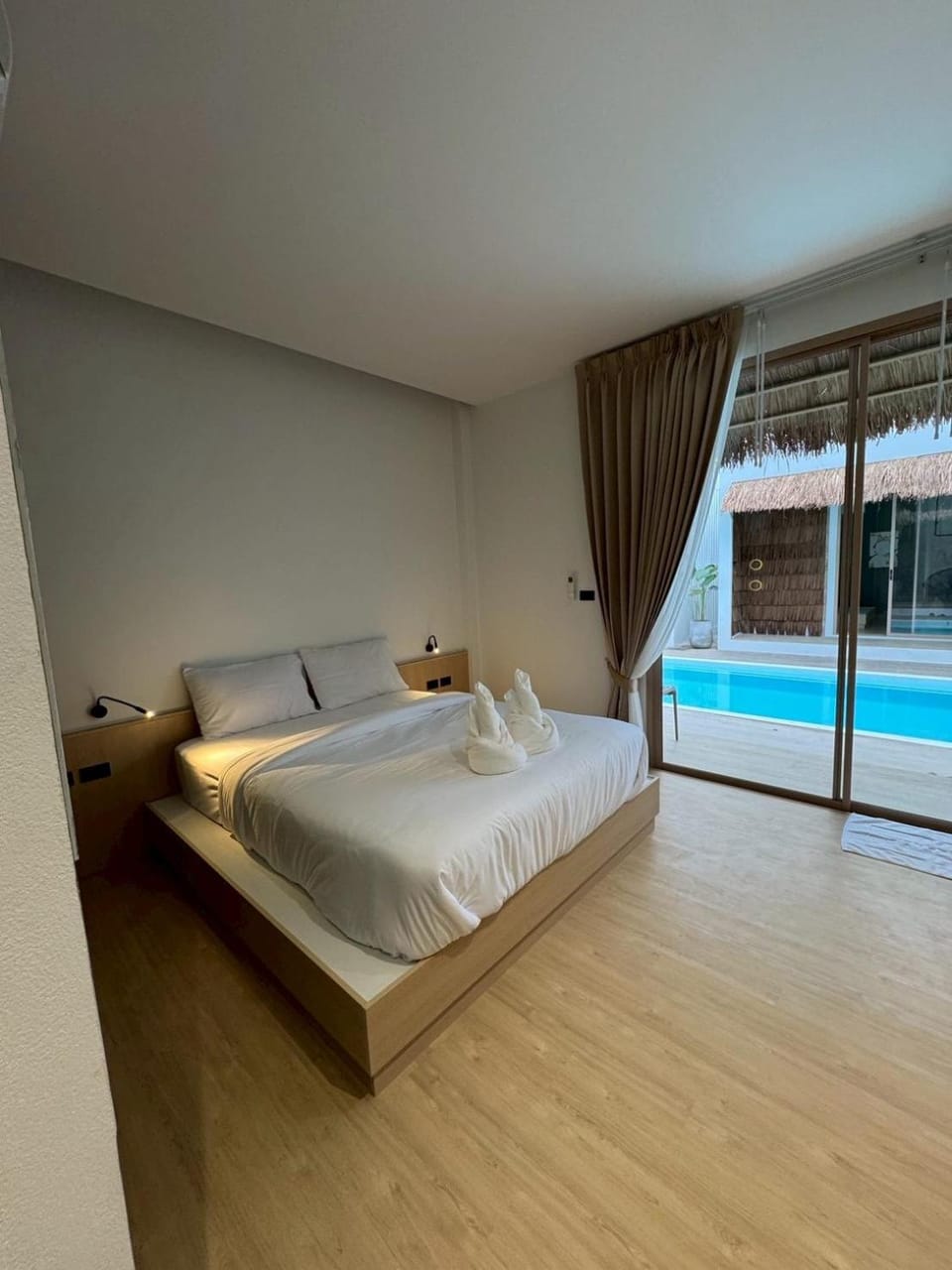 Bed, Pool view, towels