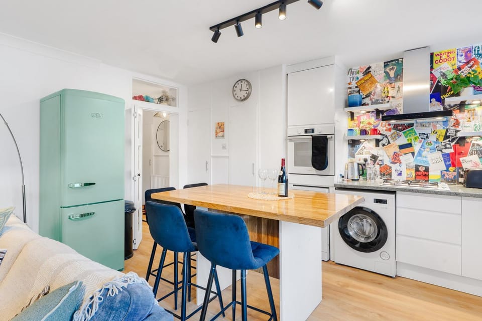 Kitchen or kitchenette, Living room, Dining area, oven, stove, washing machine, dryer