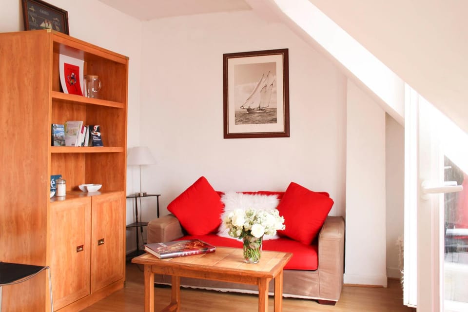 Apartment with balcony under the roofs of Paris Apartment in Paris