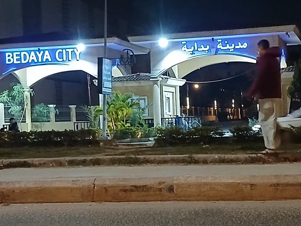 Property building, Night, People, Text overlay, Street view