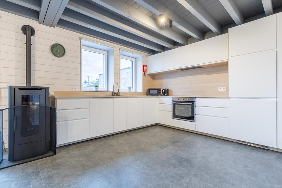 Kitchen or kitchenette, dishwasher, oven, stove, toaster