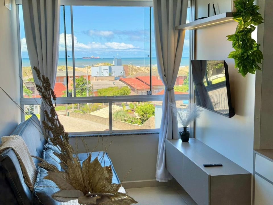 Apartamento com vista mar e perto da praia Apartment in Tramandaí