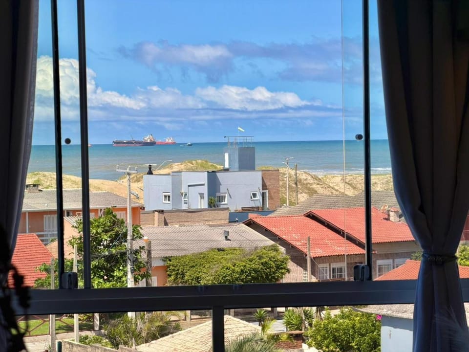 Apartamento com vista mar e perto da praia Apartment in Tramandaí