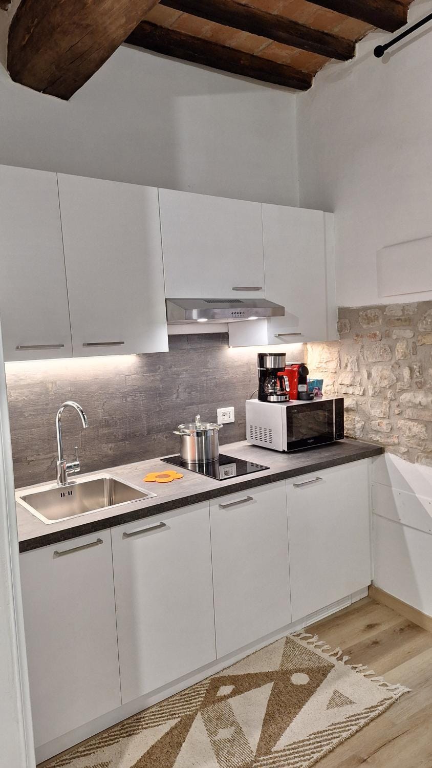 Kitchen or kitchenette, stove
