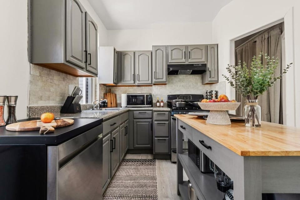 Kitchen or kitchenette, dishwasher, oven, stove, toaster