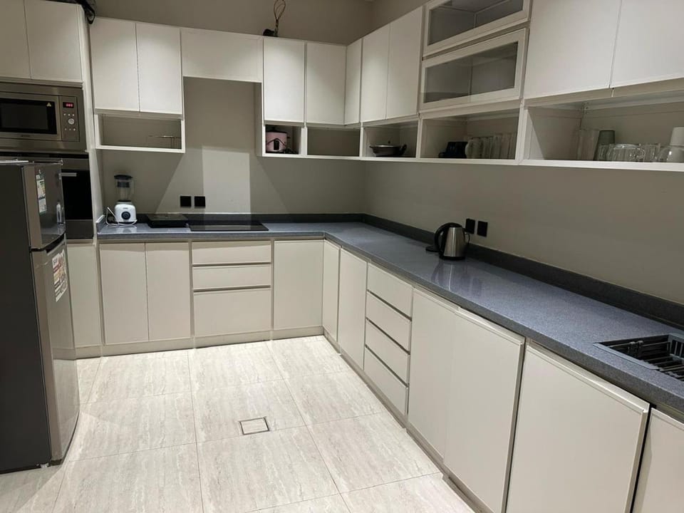 Kitchen or kitchenette, oven