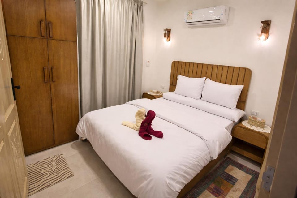 Bed, Photo of the whole room, Bedroom, towels, wardrobe, air conditioner