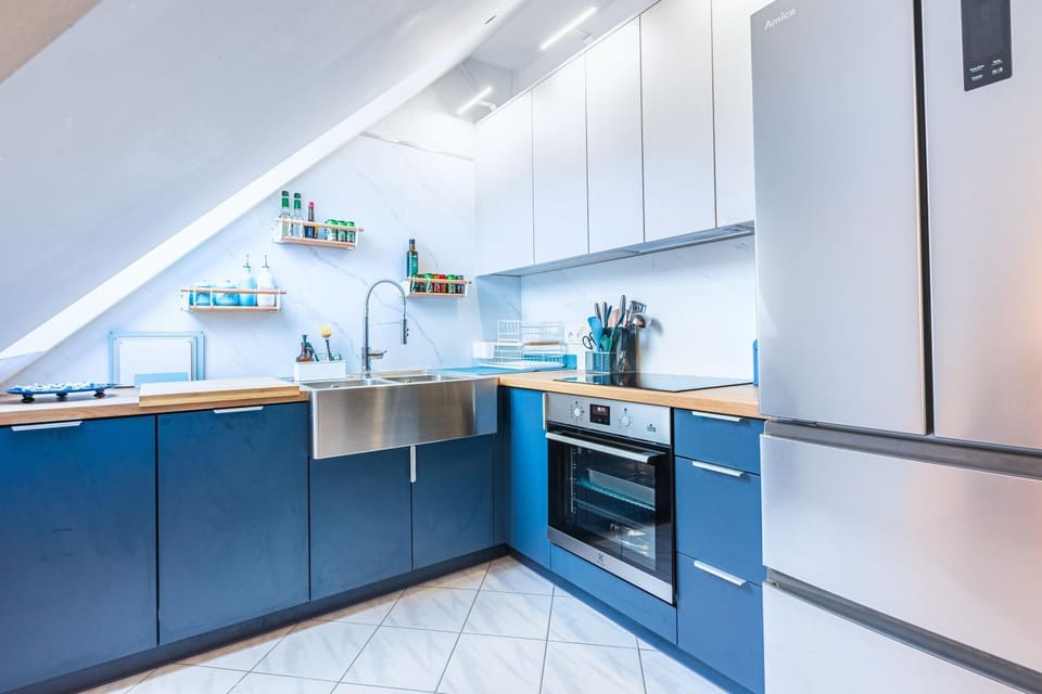 Kitchen or kitchenette, dishwasher, oven, stove, toaster