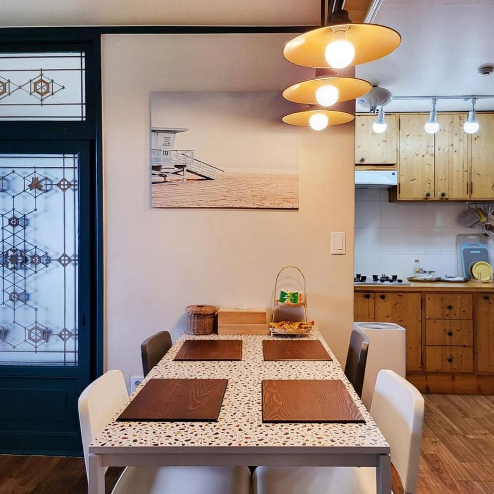 100 pyeong stone wall garden stay with the atmosphere of Jeju, Toto's sea House in South Korea