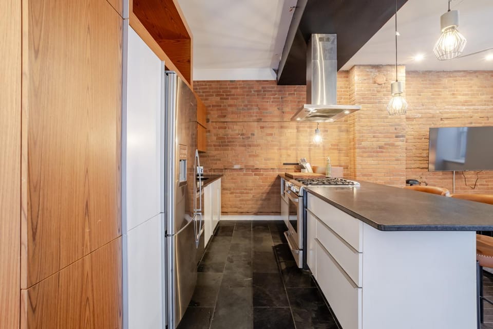 Kitchen or kitchenette, dishwasher, oven, stove