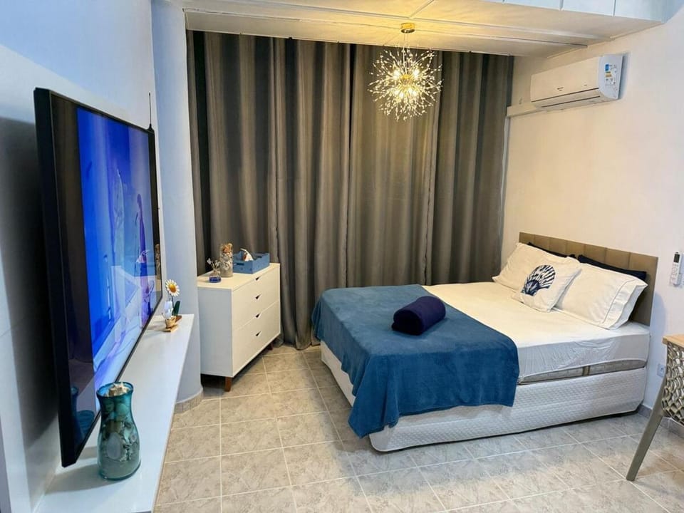 Communal lounge/ TV room, Bed, Bedroom, air conditioner
