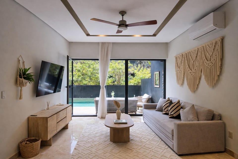 TV and multimedia, Living room, Seating area, Evening entertainment, Pool view, Swimming pool, air conditioner, air conditioner