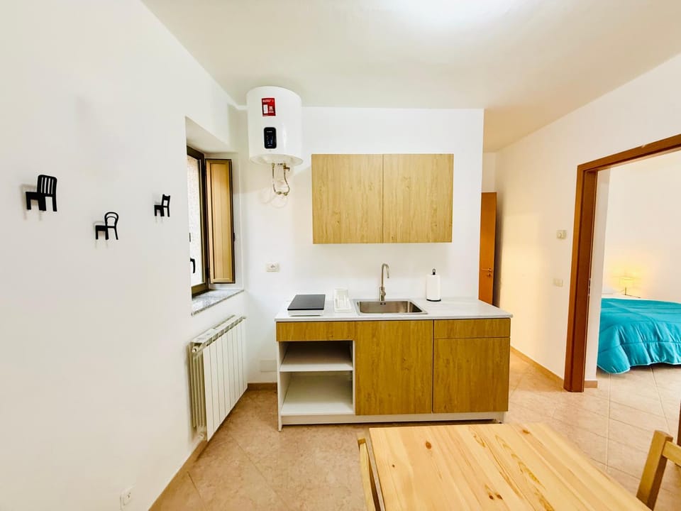 Kitchen or kitchenette, stove