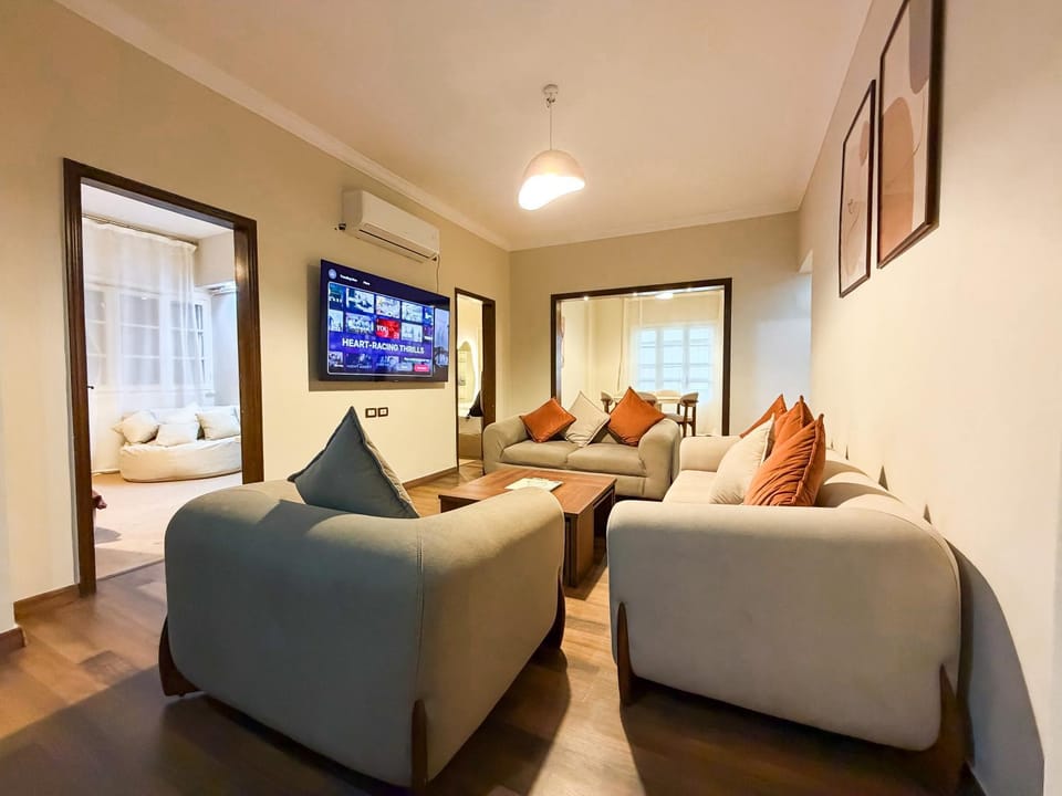 Communal lounge/ TV room, TV and multimedia, Living room, Photo of the whole room, Seating area, air conditioner