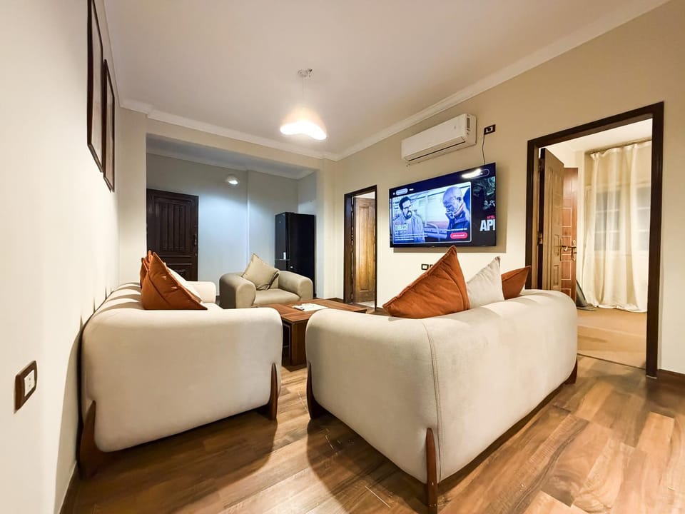 Communal lounge/ TV room, TV and multimedia, Living room, Photo of the whole room, Seating area, air conditioner