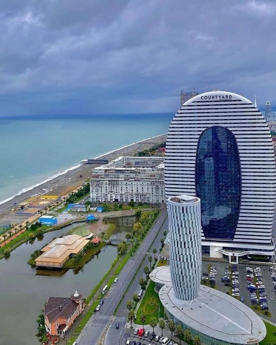 Property building, Nearby landmark, Natural landscape, Beach, City view, Location