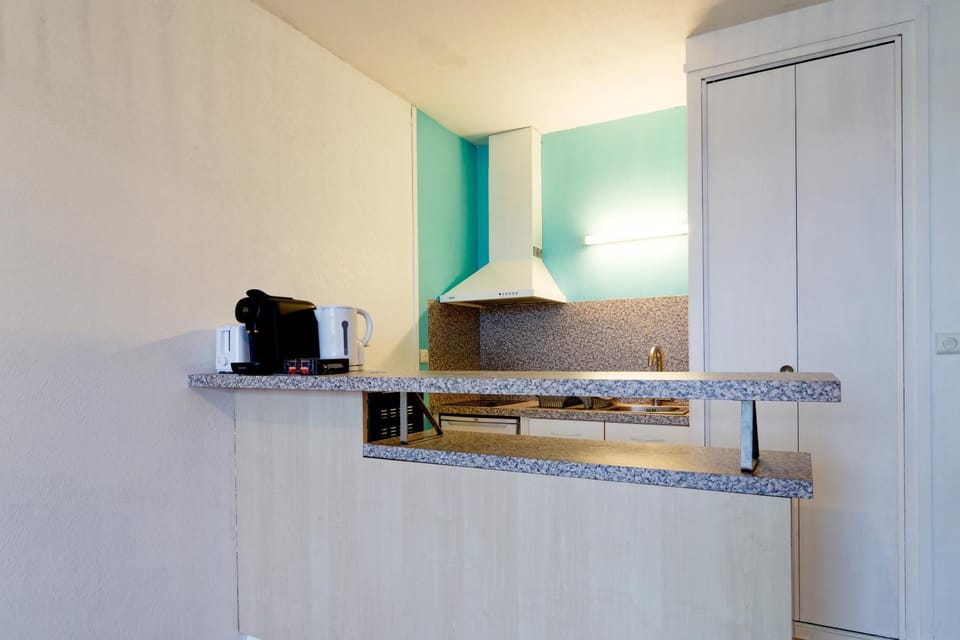 Kitchen or kitchenette, stove