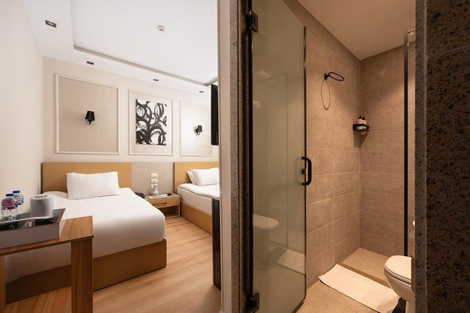 Shower, Toilet, Bed, Bathroom, Living room, Photo of the whole room, Seating area, Bedroom, towels