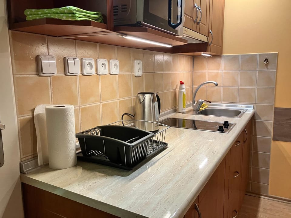 Kitchen or kitchenette, stove