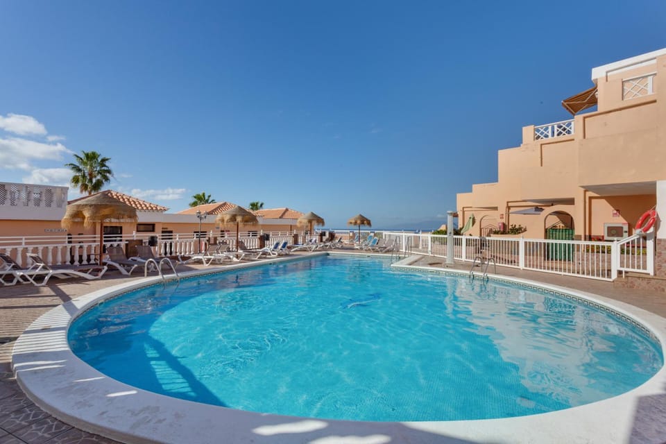 Property building, Living room, Swimming pool