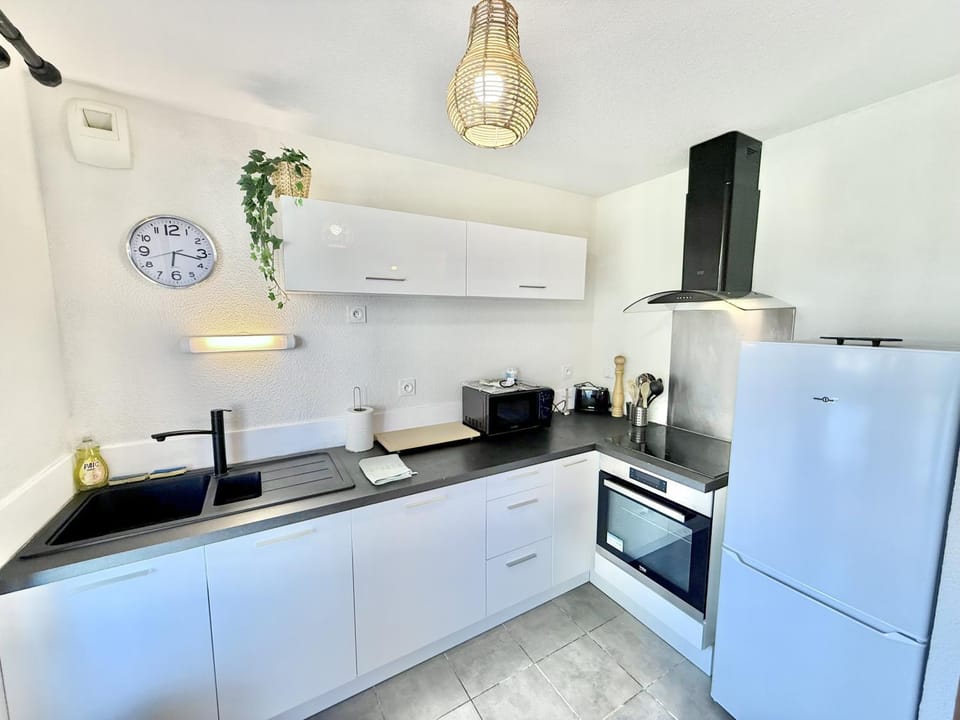 Kitchen or kitchenette, stove