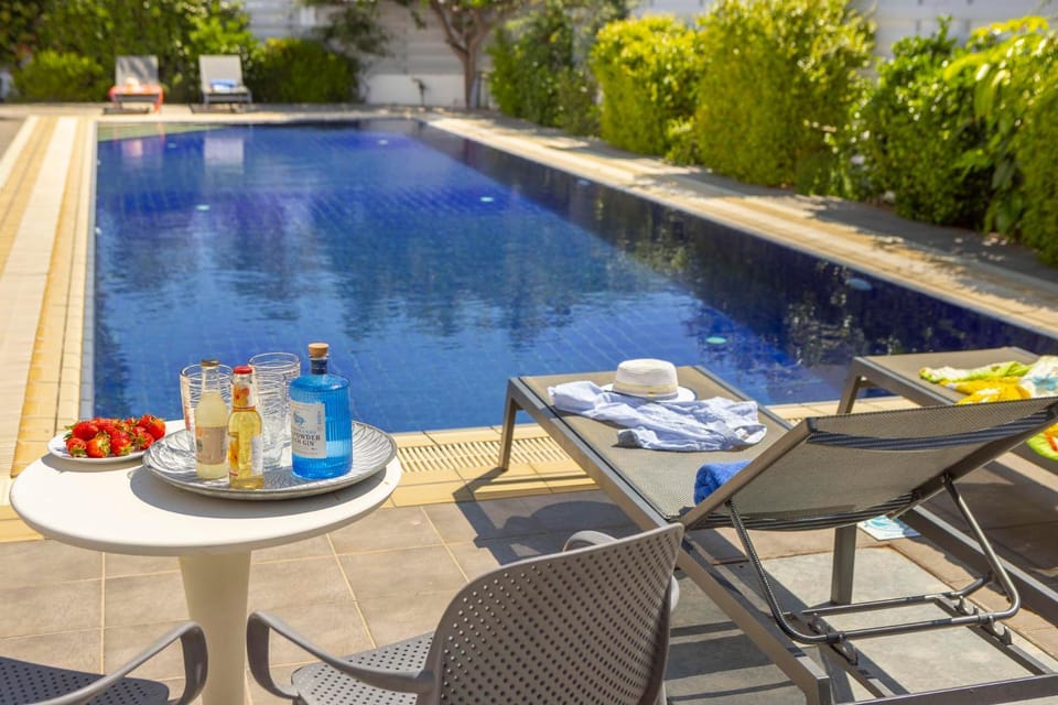 Swimming pool, sunbed