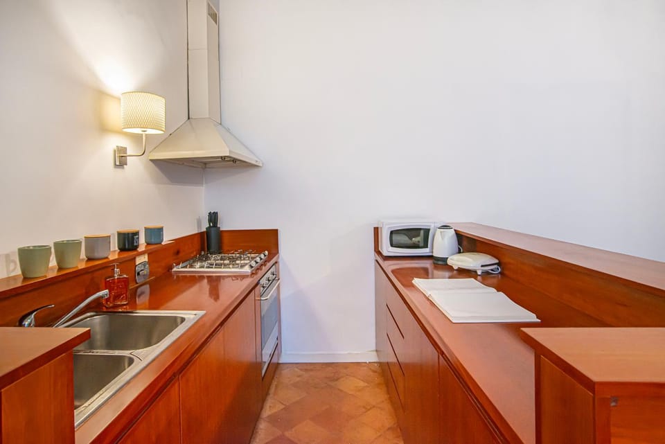 Kitchen or kitchenette, stove, toaster