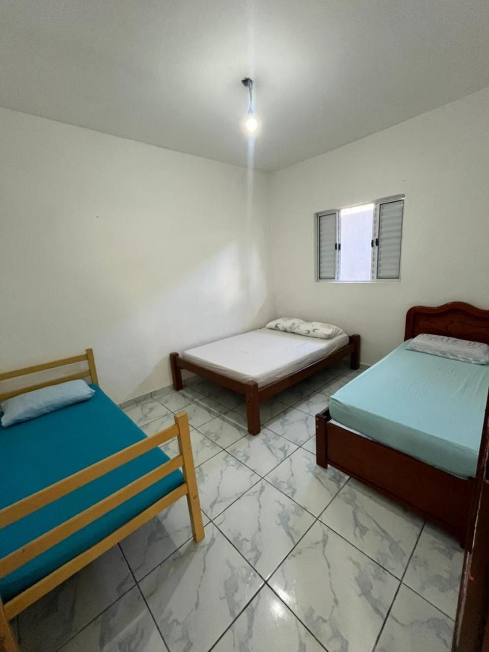 Casa grande com churrasqueira e quintal pet friendly Lagoinha até 12 pessoas House in State of São Paulo