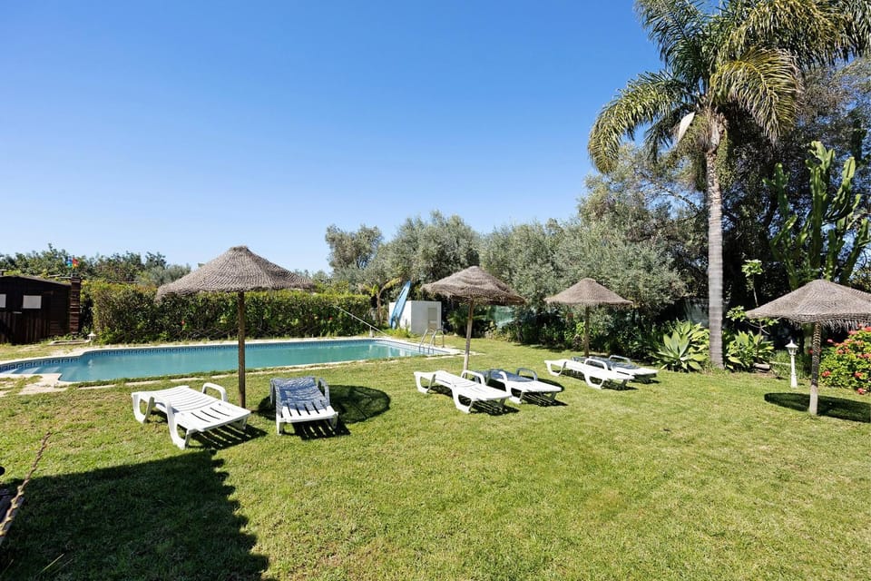 Property building, Living room, Swimming pool